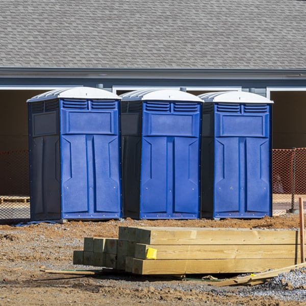 what is the cost difference between standard and deluxe portable restroom rentals in Edenville MI